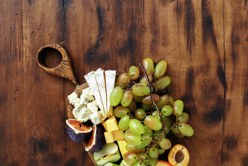 Appetizers table wine Fruit cheese wooden board