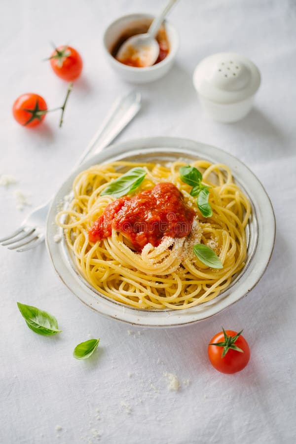 Pasta Dish with Tomato Sauce on White Plate Stock Photo - Image of