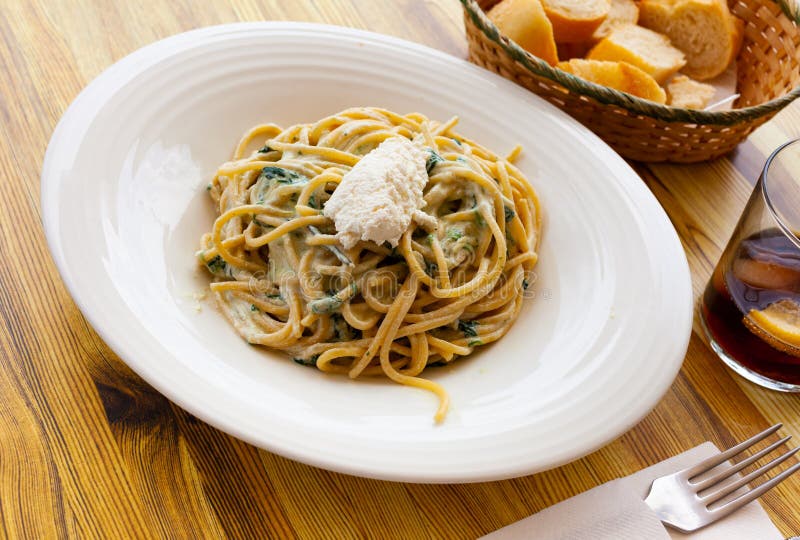 Appetizing pasta with ricotta and spinach royalty free stock photos