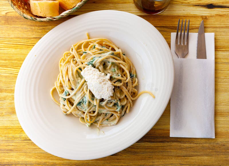 Appetizing pasta with ricotta and spinach royalty free stock photos