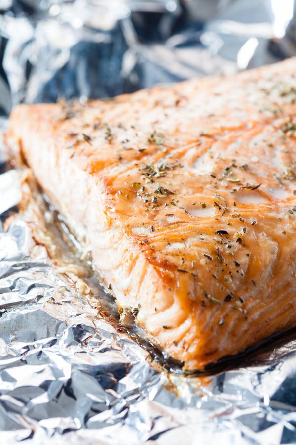 Baked salmon on the foil stock photo. Image of diet 103456634