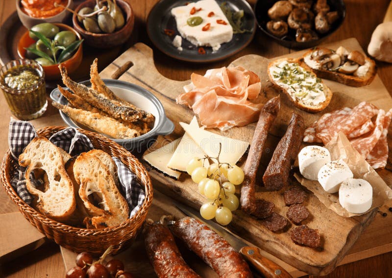 Appetizing Various Tapas on Wooden Table