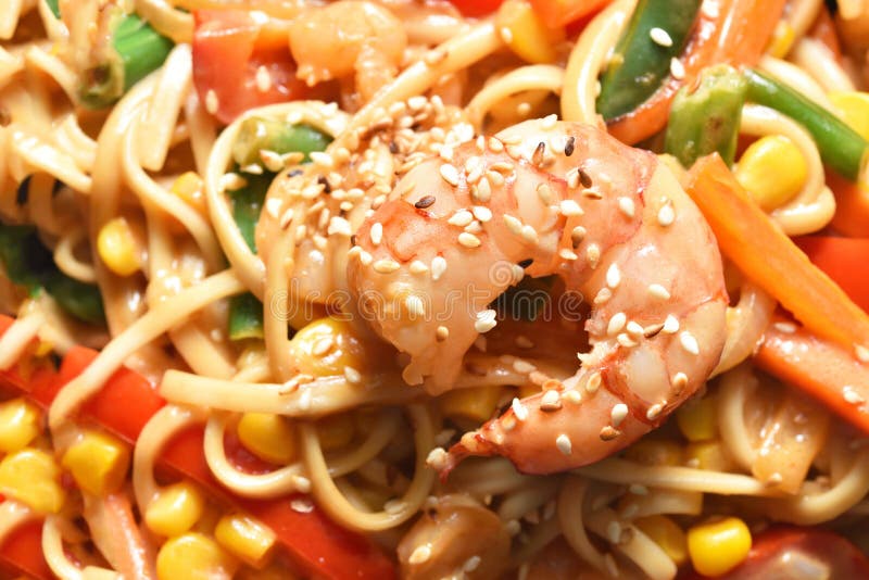 Appetizing Wok Noodles with Shrimp Closeup and Vegetables Stock Image