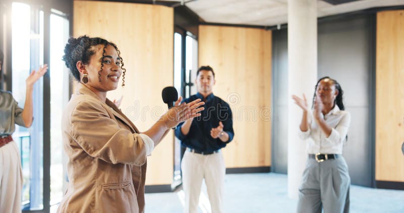 Applause, workshop or speaker in circle with mic, crowd motivation or appreciation for presenter. Business, group of royalty free stock image