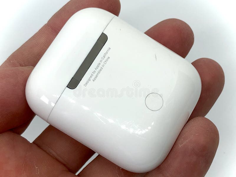 Apple AirPods in Hand