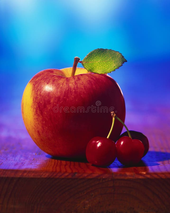 Apple and cherries stock photo. Image of individual, complete 7675626