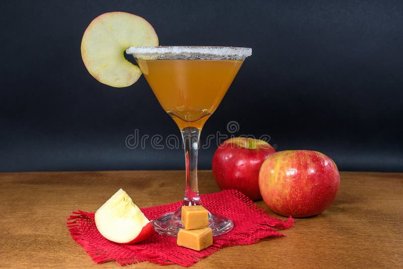 Apple cider martini with candy royalty free stock photography