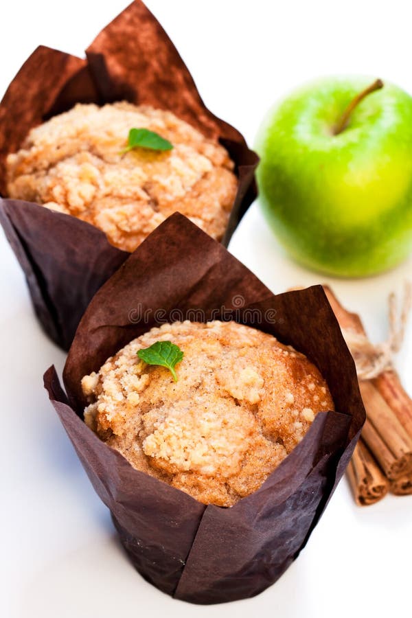 Apple cinnamon muffins isolated on white