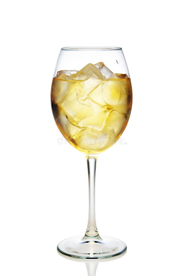 Apple cocktail with a sparkling wine with ice cubes in wine glass isolated on white