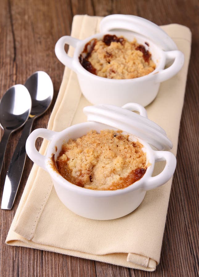Apple crumble stock image. Image of baked, ramekin, spoon 21737733