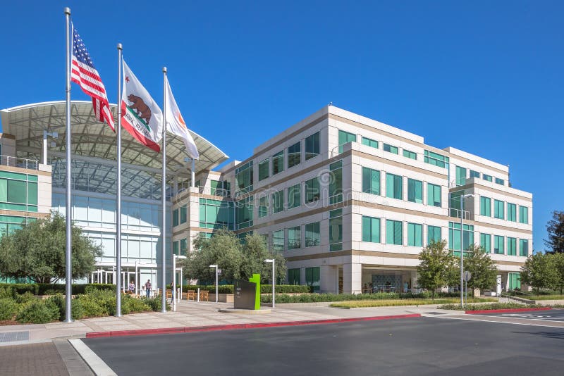 Cupertino, CA, USA - August 15, 2016: the Apple world headquarters at One Infinite Loop in California. Apple is a multinational that produces consumer electronics, personal computers and software. Cupertino, CA, USA - August 15, 2016: the Apple world headquarters at One Infinite Loop in California. Apple is a multinational that produces consumer electronics, personal computers and software.