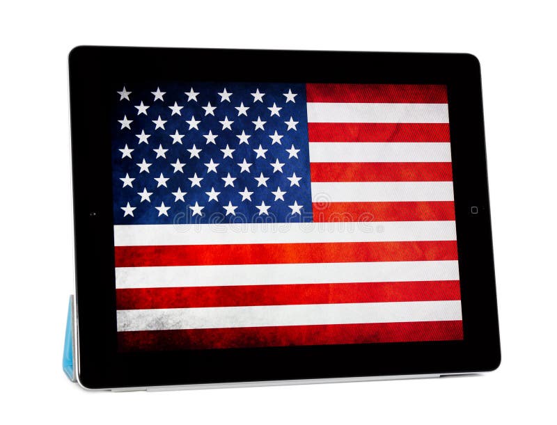 Apple iPad 2 with folded Smart cover, isolated on white background. American flag on screen. Apple iPad 2 with folded Smart cover, isolated on white background. American flag on screen.