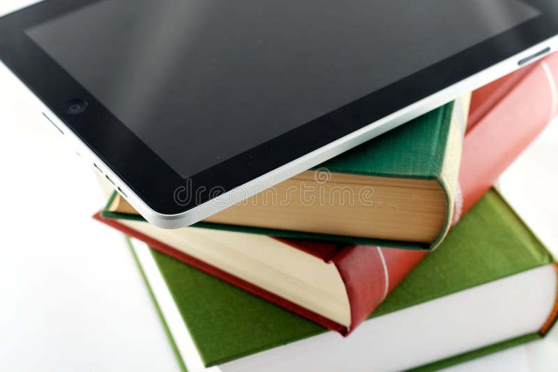 Apple Ipad on a Stack of Books Editorial Photo Image of electronic