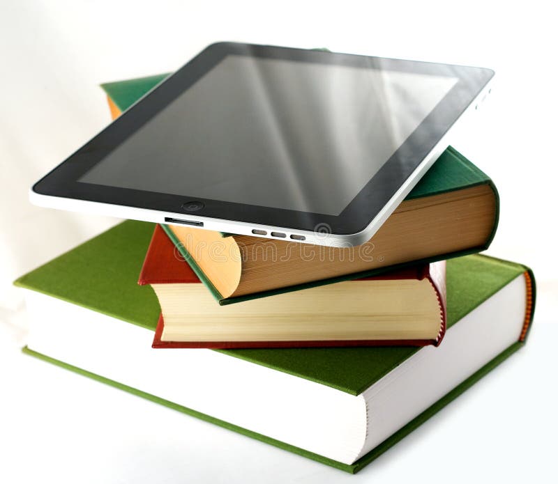 Apple ipad on a stack of books royalty free stock image Apple ipad on a stack of books royalty free stock image