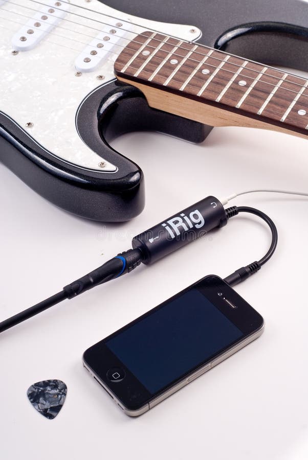 Apple iPhone iRig Electric Guitar Interface Module; Play And Record The Guitar Right On Your Phone. Iphone screen recording stock images, royalty-free photos and pictures