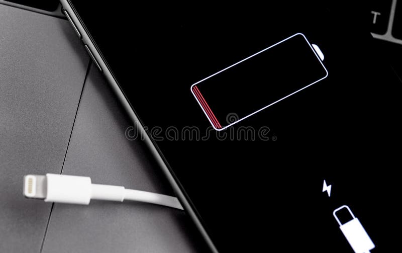 Apple IPhone Smartphone with Lightning Cable and Battery Logo on the  Display Editorial Photo - Image of electric, connection: 176589406