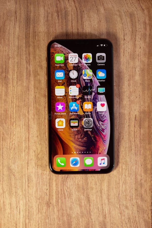 Apple IPhone Xs Max With All Apps On Wooden Background ...