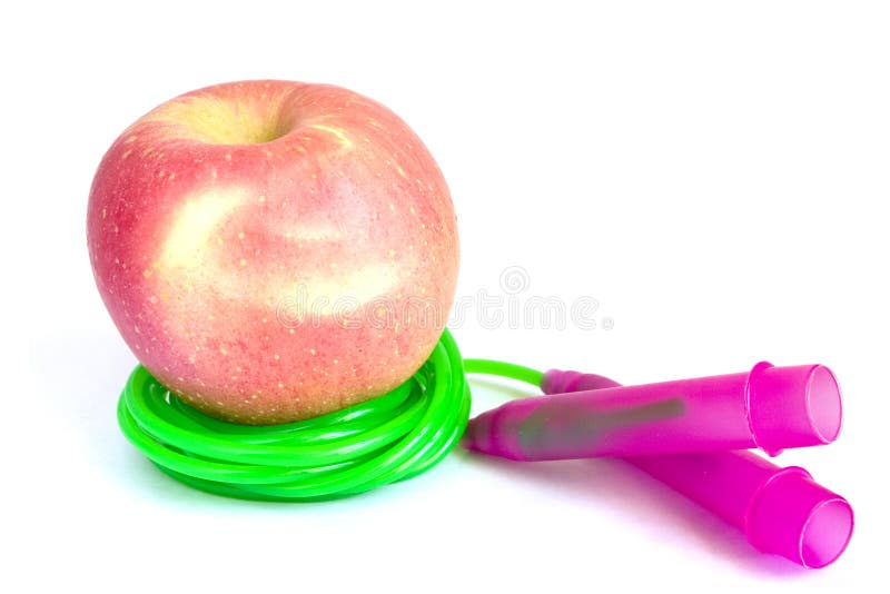 Jump rope and apple stock photo. Image of energy, food 15736140