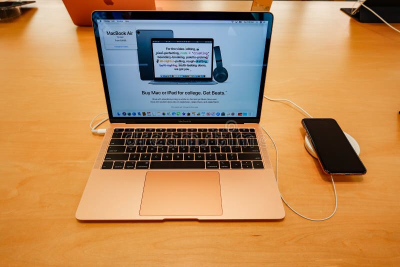 A Customer at an Apple Store Looking at His IPhone while Waiting at an Apple  Store Editorial Photo - Image of imac, computer: 237668441