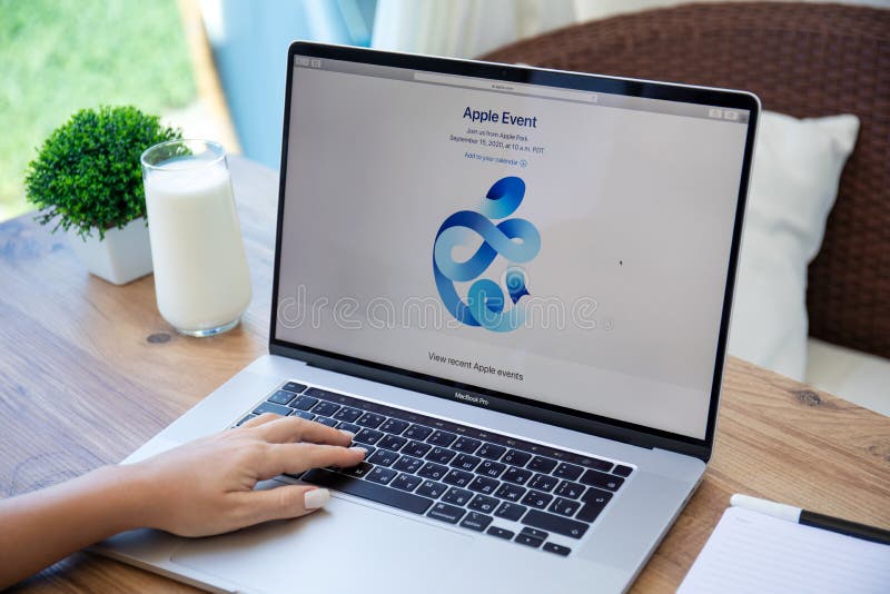 Apple Macbook Pro with page invitation Apple Event the screen royalty free stock photos