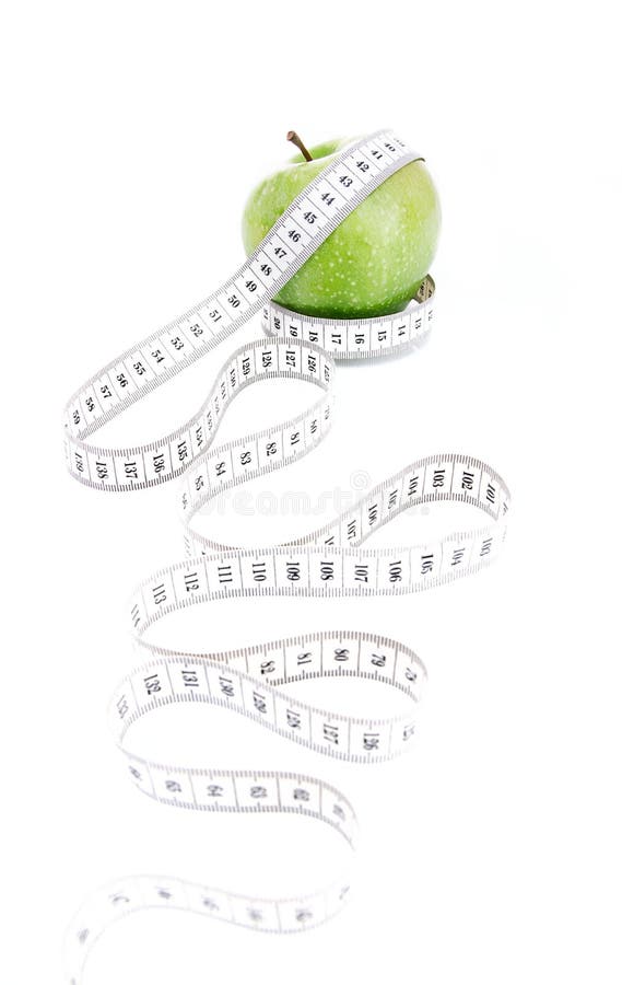 Apple with measuring tape stock photo. Image of concept 29110764