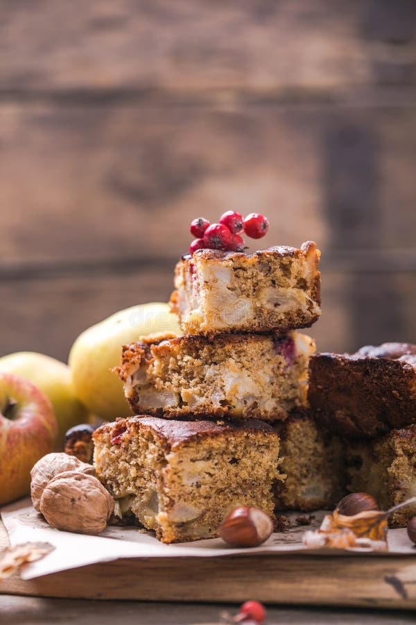 Apple nuts caramel blondies, sweet pastry on light table