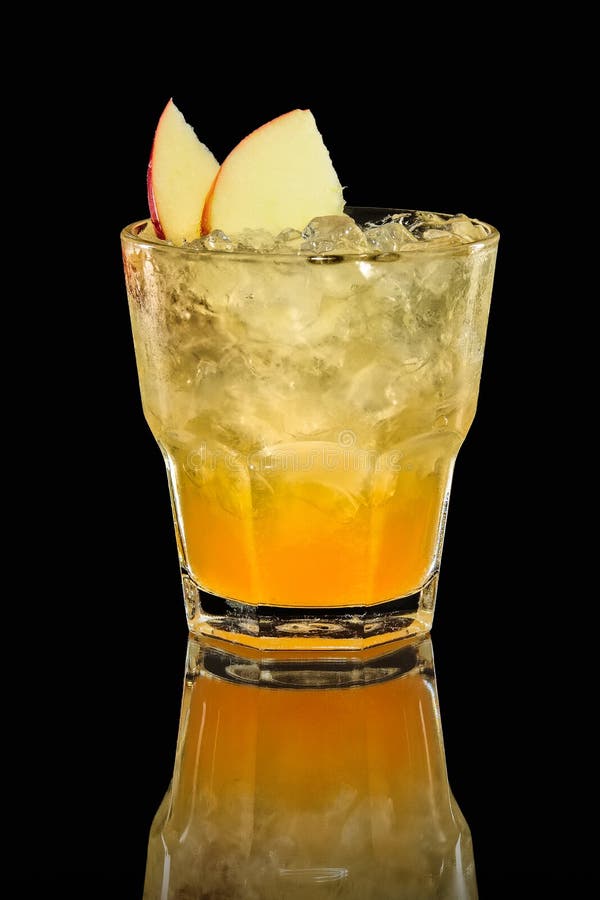 Cold Apple and Orange Cocktail with a Sparkling Wine with Ice in Wine