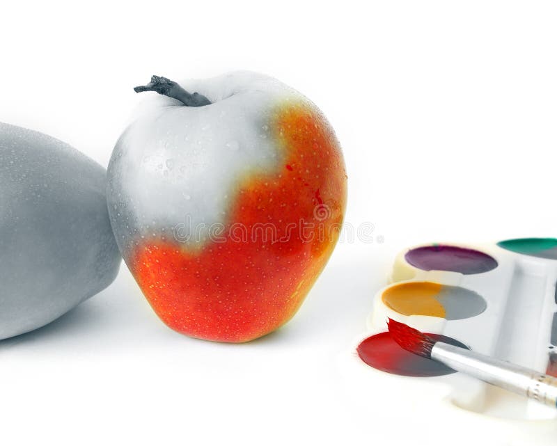 Apple and paints on white