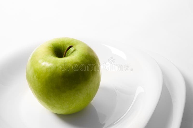 Apple on a plate stock image. Image of nutrition, natural - 13482743