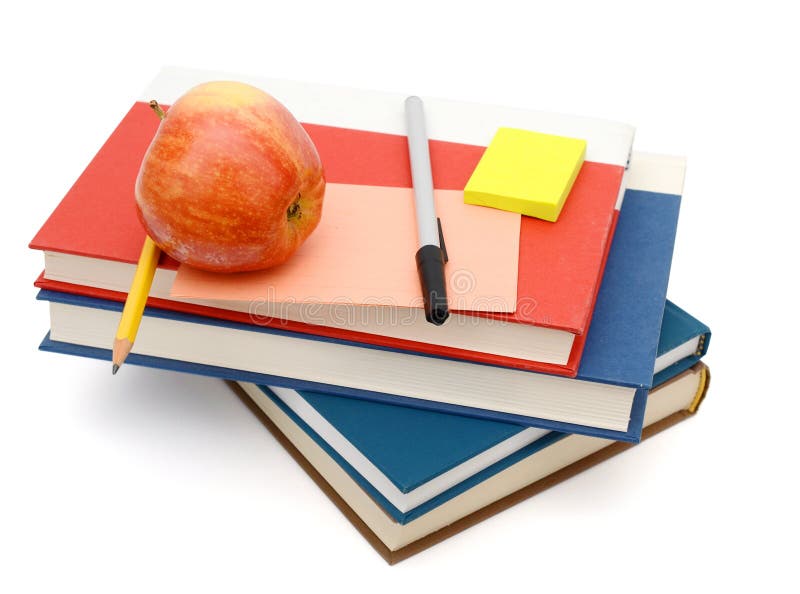 Apple on stack of books