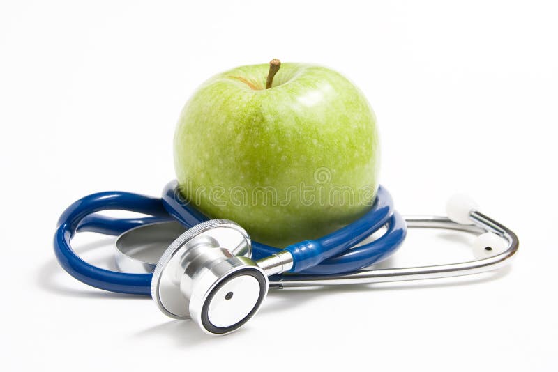Apple and stethoscope stock photo. Image of dietitian 35523120