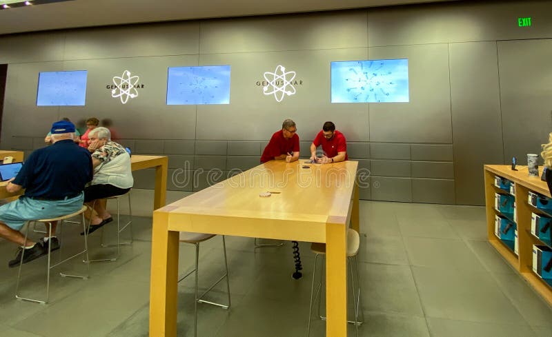 A Customer at an Apple Store Being Helped by an Apple Employee at an Apple  Store Editorial Stock Photo - Image of macbook, ipad: 235899068