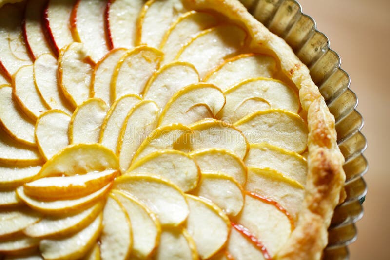 Apple tart detail with apple slices fanned in a pa royalty free stock images Apple tart detail with apple slices fanned in a pa royalty free stock images