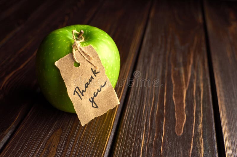 Apple with Thank You Lable on Dark Wooden Background. Happy ...