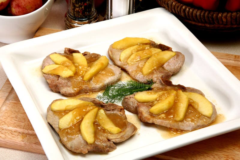 Apple Topped Pork Chops royalty free stock photos Apple Topped Pork Chops royalty free stock photos