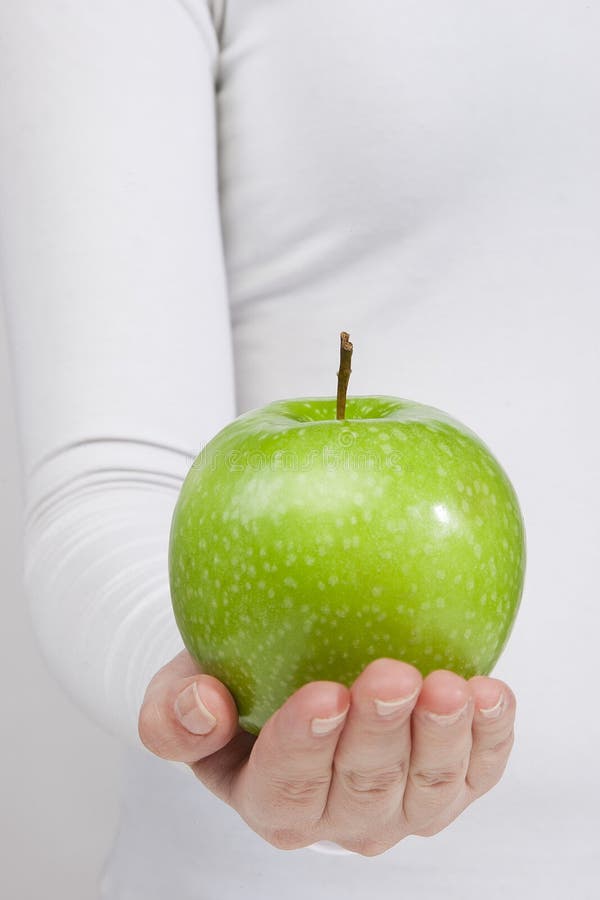 Apple in woman hands