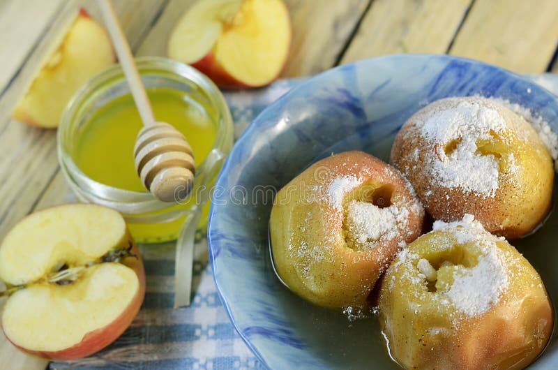 Apples baked in the oven stock photo. Image of baked 64579642