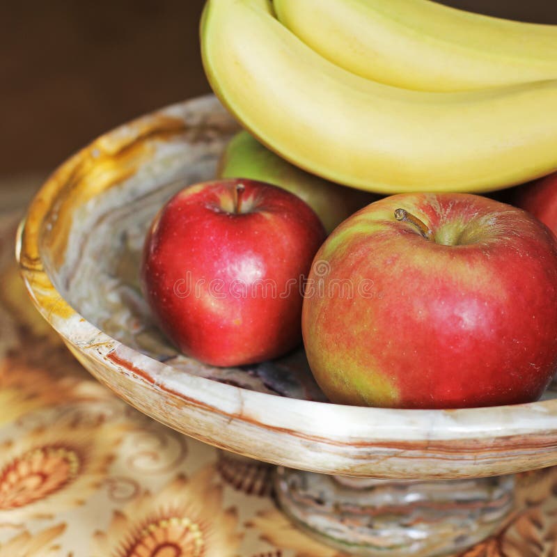 Apples and Bananas on a White Background. Stock Photo Image of