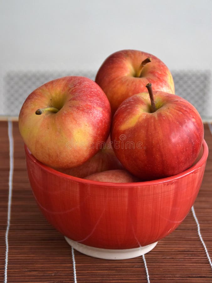 Apples in a bowl stock photo. Image of home, vegetable 100018756