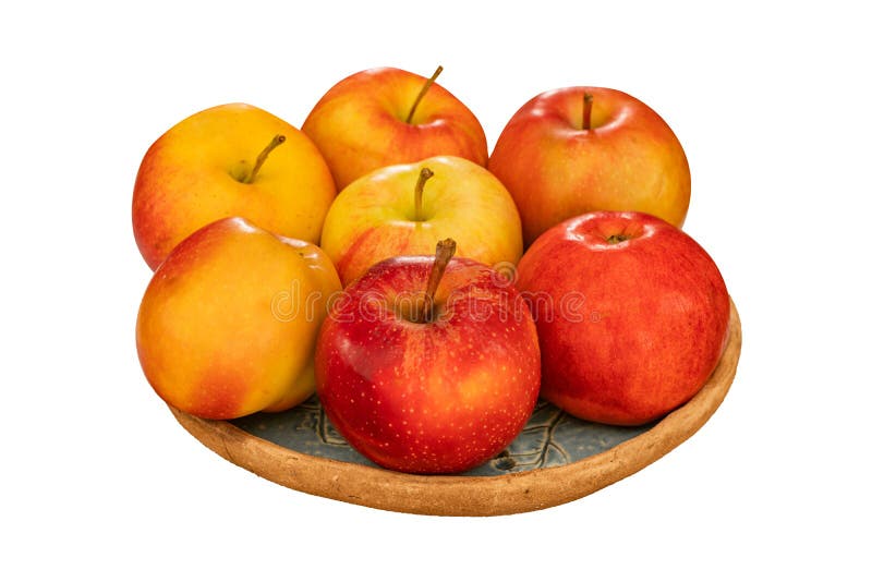 7 apples (Gala) of yellow-red color on a clay plate is isolated on white background