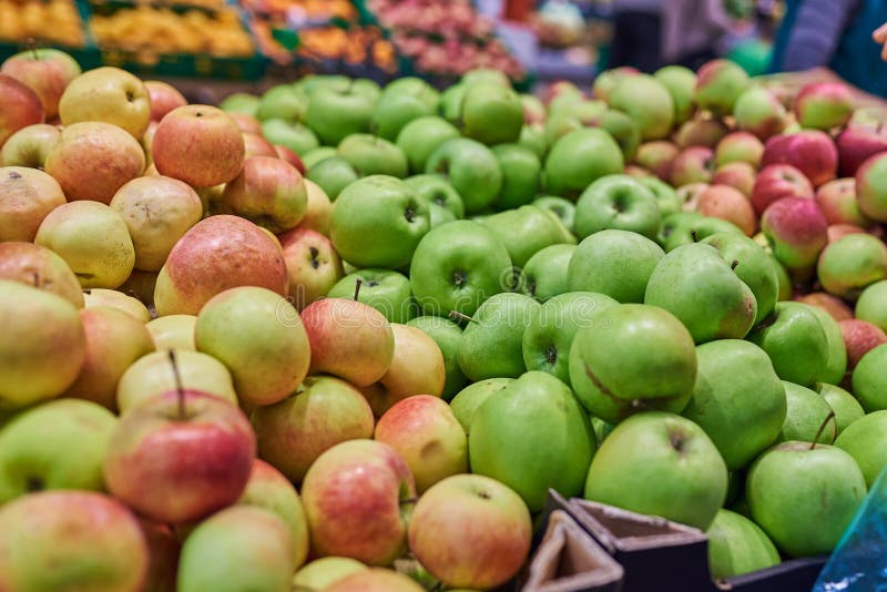 Apples green and red in the store stock photo