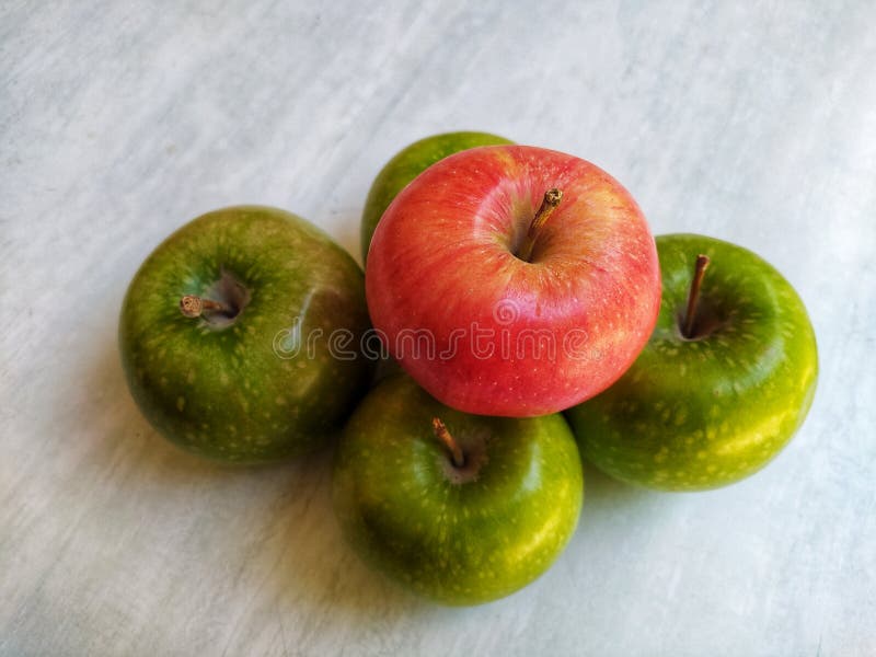 Apples. Green and red apples on a white background royalty free stock photography.