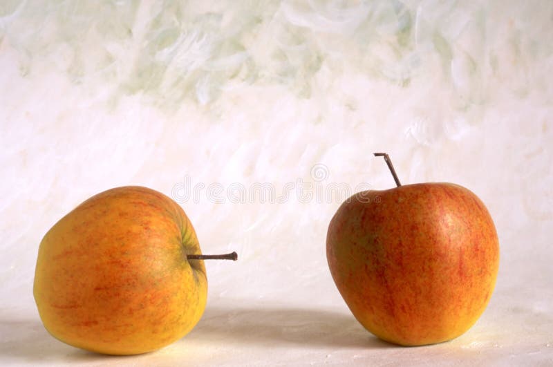 Apples on painted background