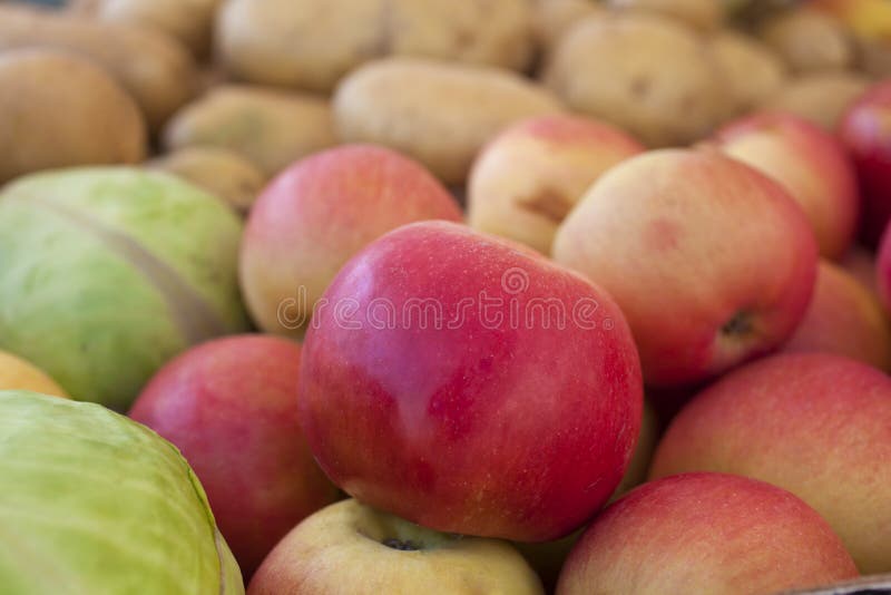 Apples on a shelf
