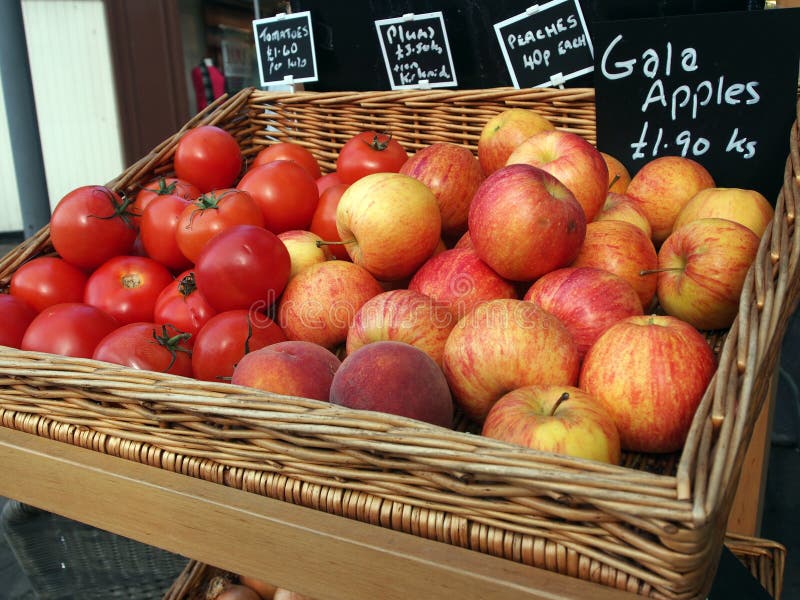 Apples and Tomato for sale stock photo. Image of tomatos 39492132