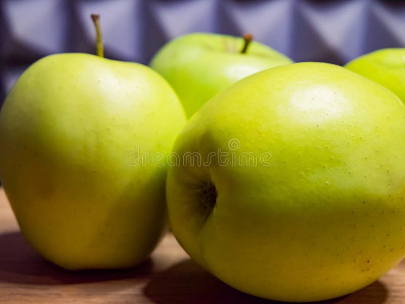 Apples on a wooden table, freshness emphasized royalty free stock photos