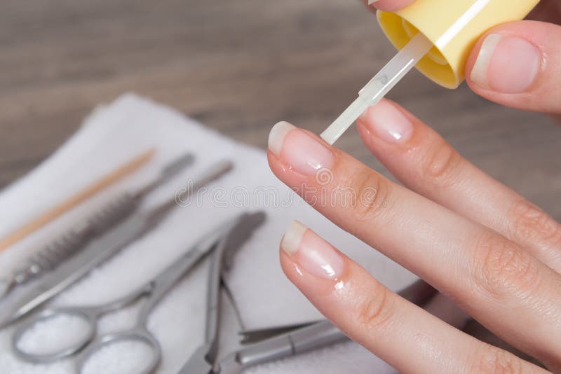 Apply Oil To the Cuticle. Manicure, Nail Care. Nail Salon, Procedure, SPA.  Home Nail Care. Manicure Tools Stock Photo - Image of applying, hygiene:  174950444