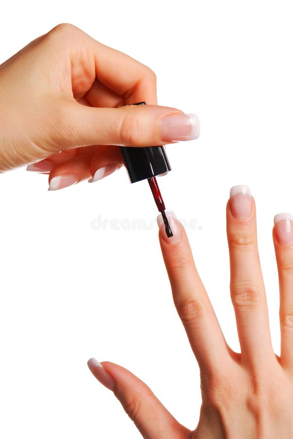 Applying nail polish royalty free stock image