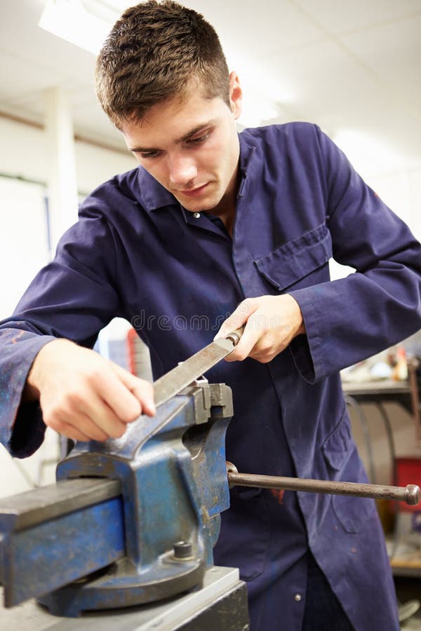 Apprentice Engineer Working On Factory Floor stock images Apprentice Engineer Working On Factory Floor stock images