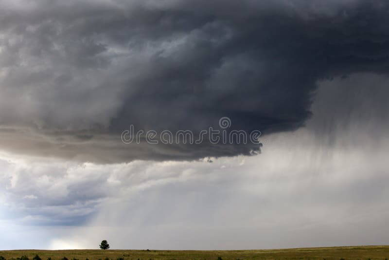 Approaching Prairie Thunderstorm on Lone Tree stock photography